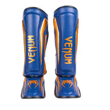 VENUM ELITE STANDUP SHINGUARDS BLUE BLACK COPPER FRONT SIDE